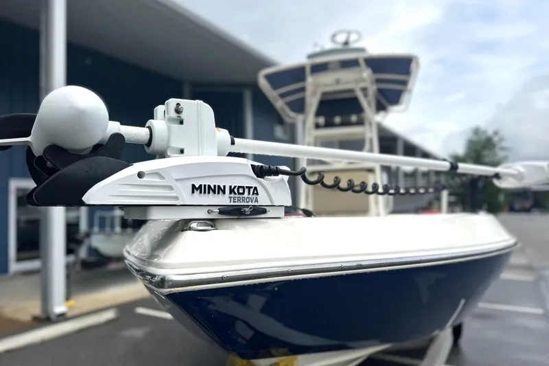 Slide: The Image of 2014 Skeeter SX2250 boat with Minn Kota Terrova trolling motor, parked outdoors. - 20