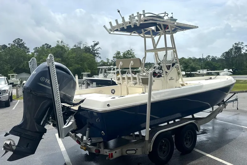 Slide: The Image of 2014 Skeeter SX2250 boat with Yamaha outboard motor on trailer. - 7