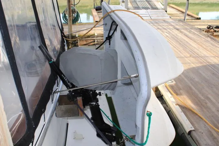 Slide: The Image of 1992 Bayliner 3288 Motoryacht docked, showcasing rear deck and equipment. - 21