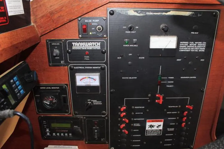 Slide: The Image of Control panel of a 1992 Bayliner 3288 Motoryacht with various monitoring systems. - 33