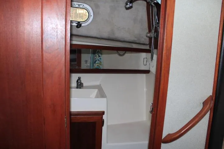 Slide: The Image of Bathroom interior of 1992 Bayliner 3288 Motoryacht with sink and shower. - 44