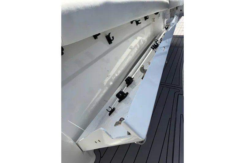 Slide: The Image of 2019 HCB 42 Siesta boat storage compartment with hooks and fittings on deck. - 13