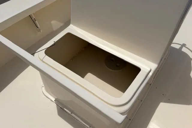 Slide: The Image of Open storage compartment on 2026 Jones Brothers Bateau 23 boat. - 7