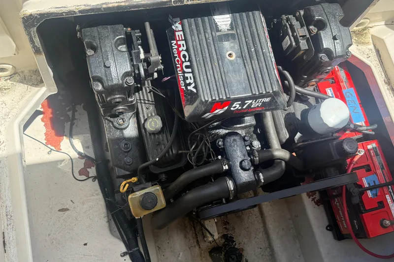 Slide: The Image of Engine compartment of a 2004 Sea Ray 215 Weekender with Mercury 5.7L EFI motor. - 19