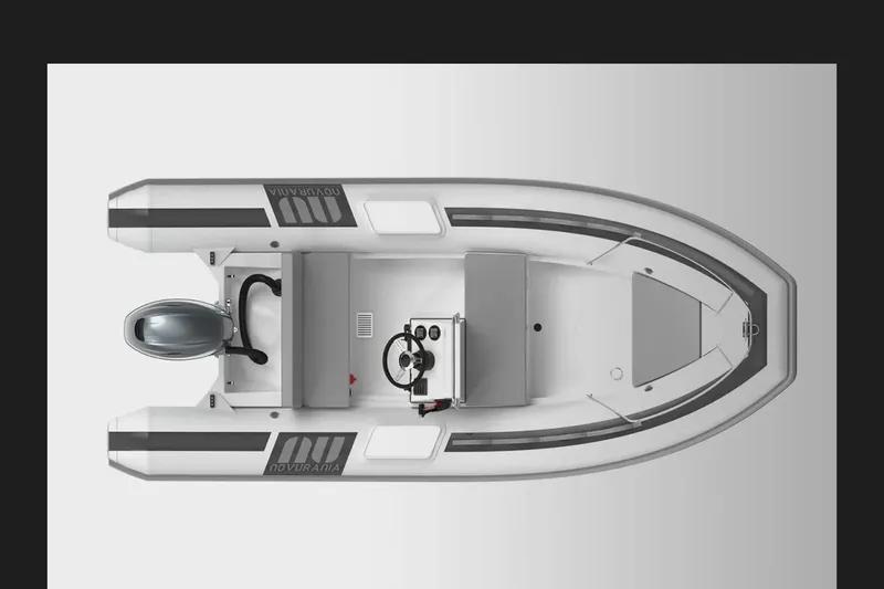 Slide: The Image of Top view of a 2016 Caribe 16 inflatable boat with motor and steering console. - 7
