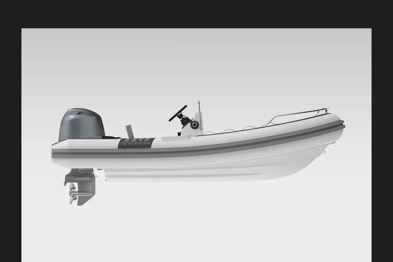 Slide: The Image of Caribe 16 inflatable boat, 2016 model, side view with outboard motor. - 5