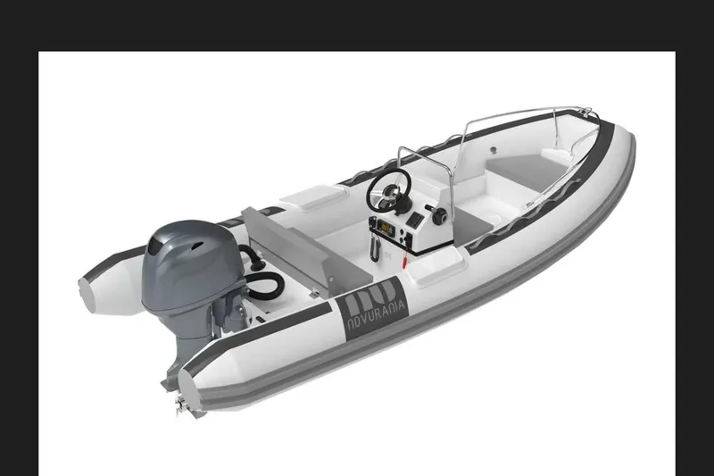 Slide: The Image of 2016 Caribe 16 inflatable boat with outboard motor and steering console. - 6