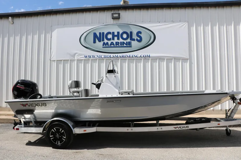 The Image of 2026 Vexus Defender 201 boat on trailer at Nichols Marine dealership. - 0