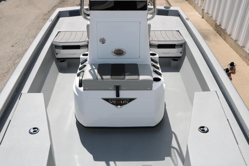 Slide: The Image of 2026 Vexus Defender 201 boat interior with seating and console, showcasing modern design. - 22