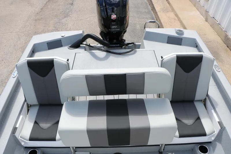 Slide: The Image of 2026 Vexus Defender 201 boat interior with stylish gray and black seating. - 26