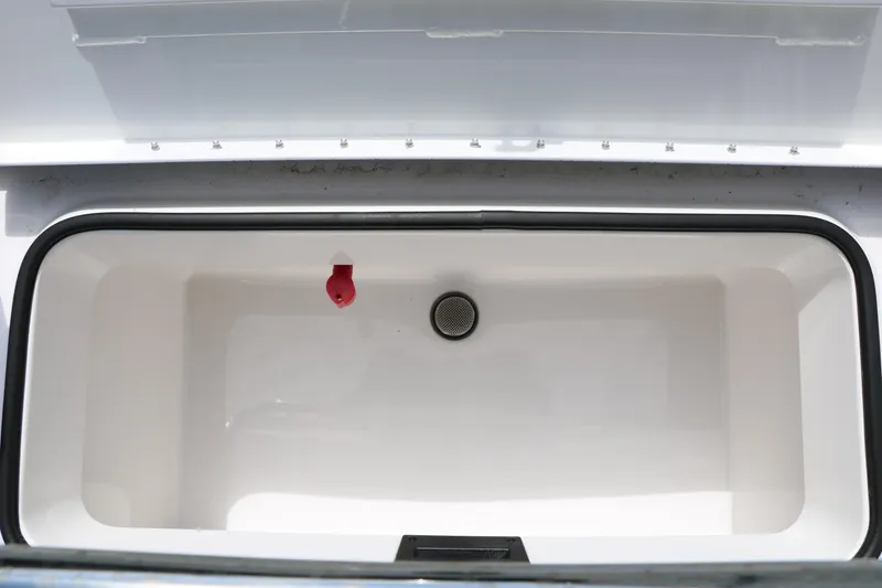 Slide: The Image of Open storage compartment in 2026 Vexus Defender 201 boat, featuring a clean interior design. - 30