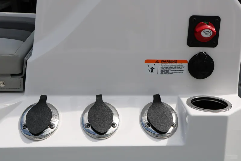 Slide: The Image of Control panel of 2026 Vexus Defender 201 boat with warning label and switches. - 32
