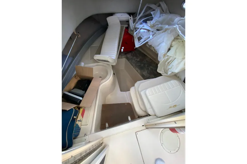Slide: The Image of Interior of a 1997 Grady-White Gulfstream 232 boat with seating and storage. - 10