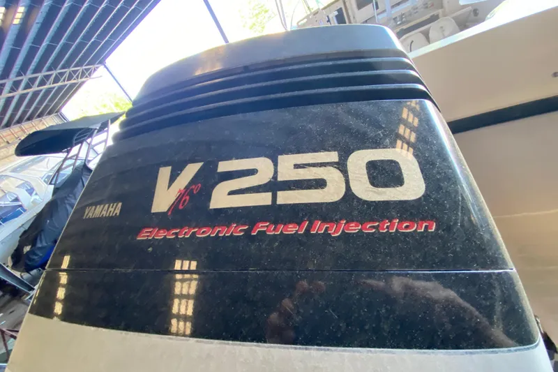 Slide: The Image of Yamaha V6 250 outboard engine with electronic fuel injection on a 1997 Grady-White Gulfstream 232. - 11