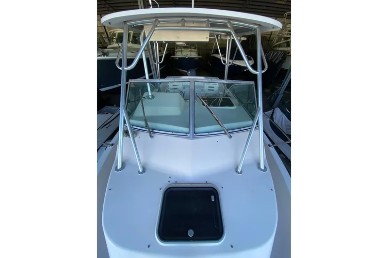 Slide: The Image of 1997 Grady-White Gulfstream 232 boat with windshield and sturdy metal frame. - 8