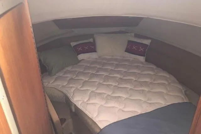 Slide: The Image of Cozy cabin interior of 2013 Ranger Tugs R-29 S with comfortable bedding. - 31