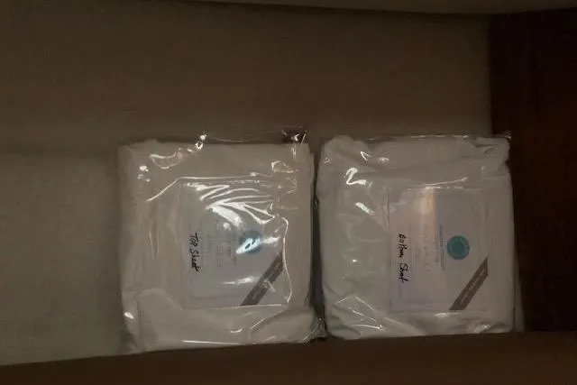 Slide: The Image of Two packaged items inside a Ranger Tugs R-29 S, 2013 model. - 32