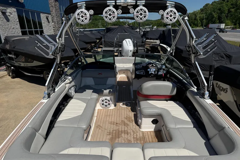 Slide: The Image of 2008 MasterCraft X-45 boat interior with seating, speakers, and control panel. - 14