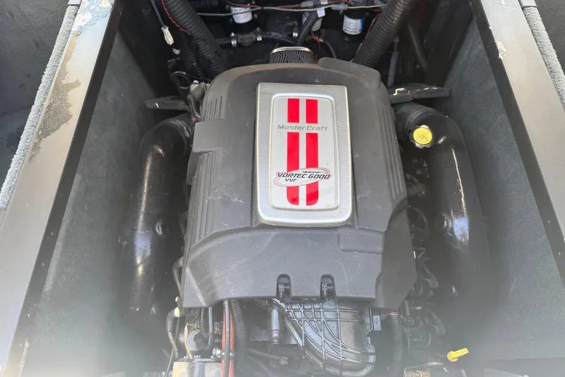 Slide: The Image of 2008 MasterCraft X-45 engine compartment featuring Vortec 6000 VVT engine. - 16