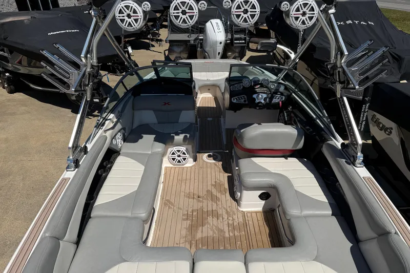 Slide: The Image of 2008 MasterCraft X-45 boat interior with seating, speakers, and control panel. - 17