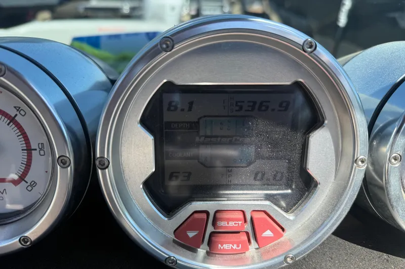Slide: The Image of Dashboard of a 2008 MasterCraft X-45 boat showing gauges and controls. - 9