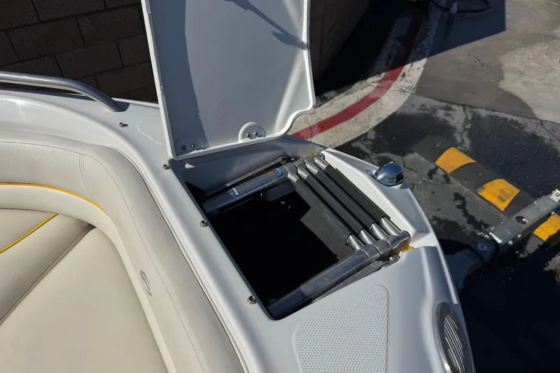 Slide: The Image of Open hatch on 2008 Crownline 200 LS boat showing folded ladder. - 13