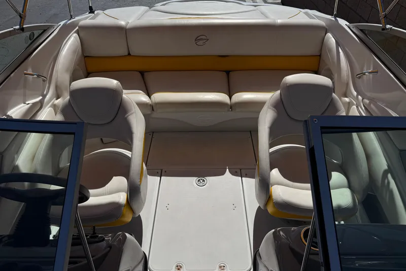 Slide: The Image of Interior of a 2008 Crownline 200 LS boat with beige seating. - 14