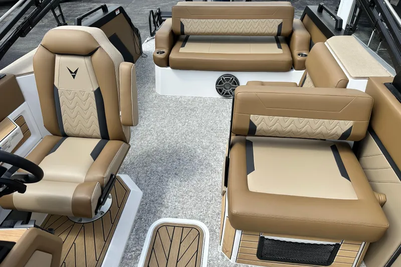 Slide: The Image of Luxurious interior of 2026 Revel RS25 boat with tan leather seating and modern design. - 10