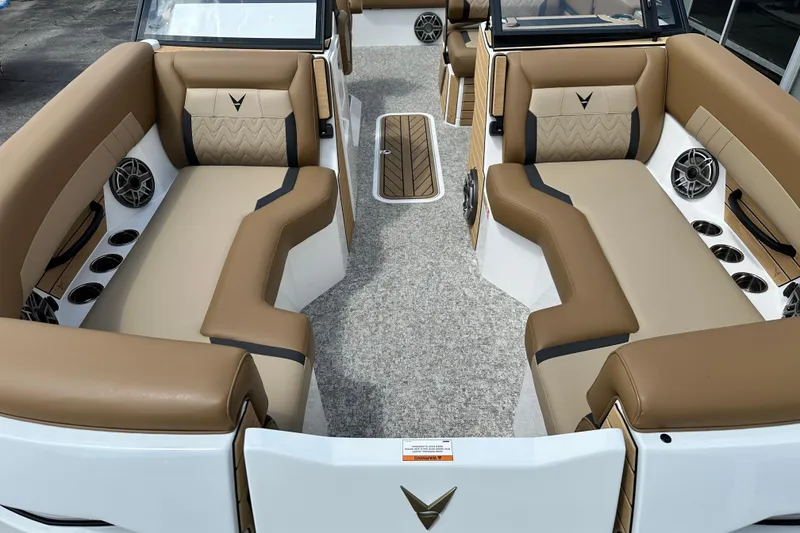 Slide: The Image of Luxurious interior of 2026 Revel RS25 boat with tan seating and modern design. - 9
