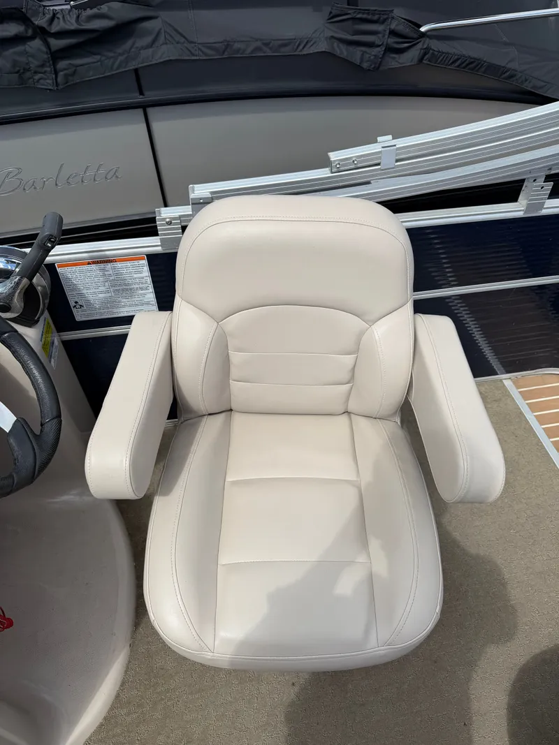 Slide: The Image of Beige captain's chair on a 2016 Starcraft Stardeck 206 Cruise boat. - 5