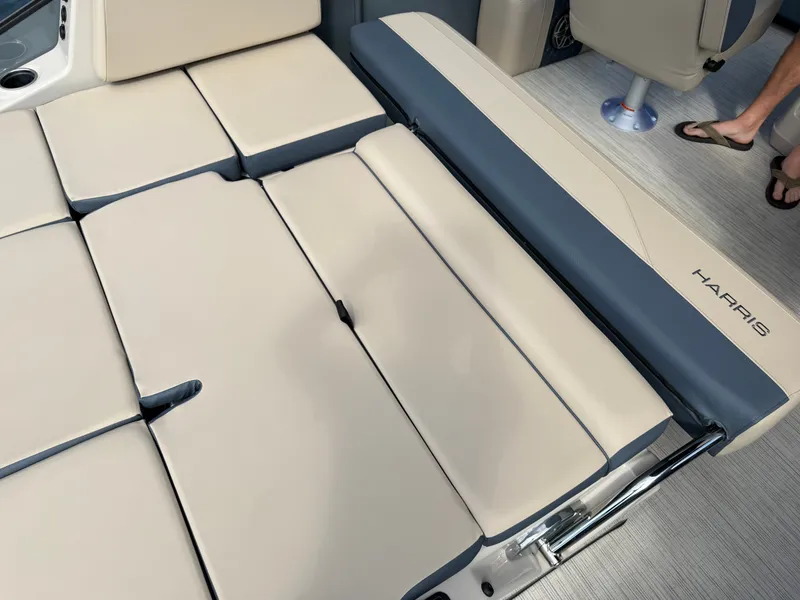 Slide: The Image of The 2027 Harris Grand Mariner 250 features a luxurious beige lounging area with blue accents. - 20