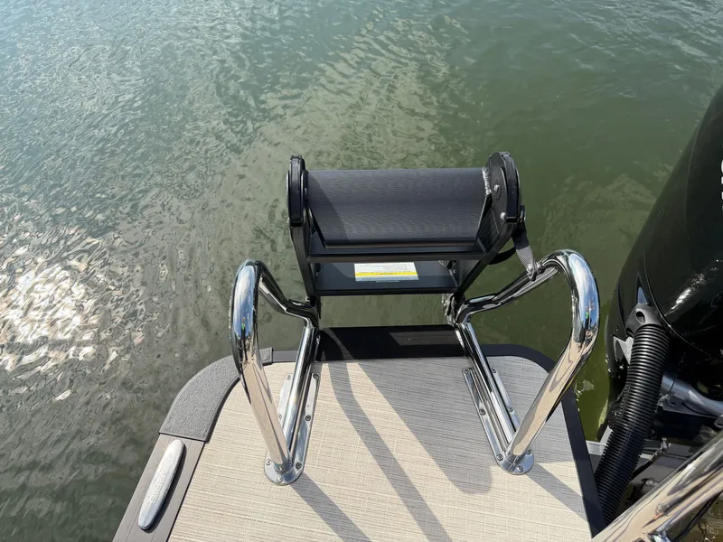 Slide: The Image of Swim ladder at the stern of a boat, over calm water. - 22