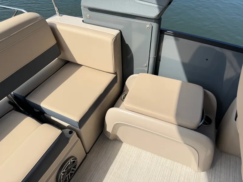 Slide: The Image of The 2027 Harris Grand Mariner 250 features beige upholstery and a modern design. - 17