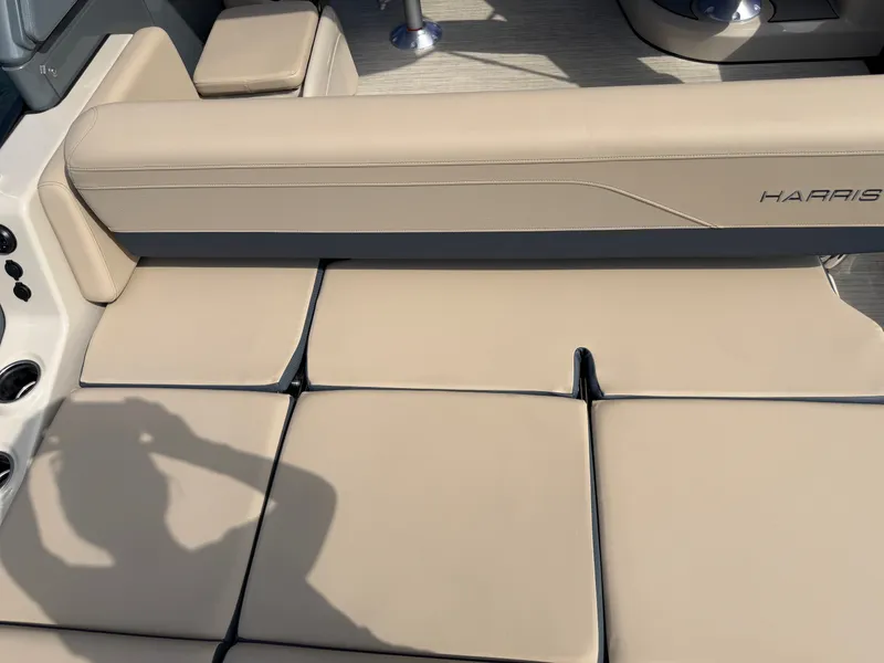 Slide: The Image of Harris Grand Mariner 250 from 2027 with beige upholstery and sleek details. - 18