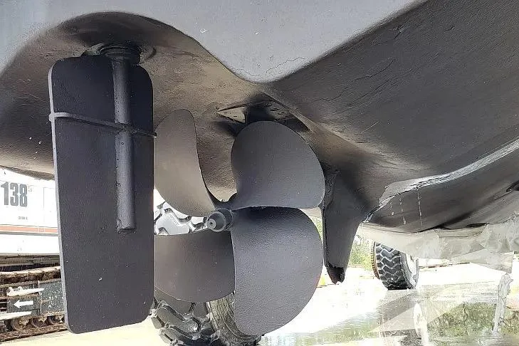 Slide: The Image of Propeller and rudder of 2014 Aquila 48 boat, close-up view. - 10