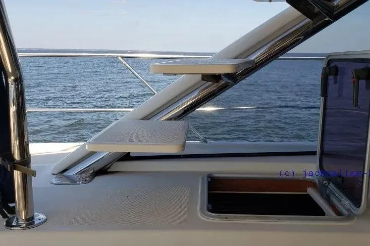 Slide: The Image of Aquila 48 yacht interior with steps and ocean view, 2014 model. - 15