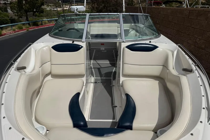 Slide: The Image of 2002 Monterey 248LS Montura Bowrider with spacious seating and sleek design. - 11