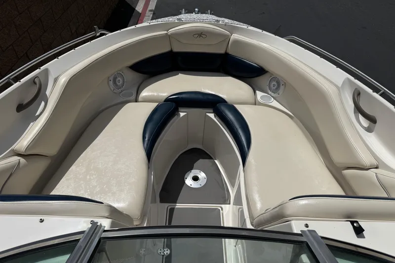 Slide: The Image of 2002 Monterey 248LS Montura Bowrider with spacious seating and sleek design. - 14