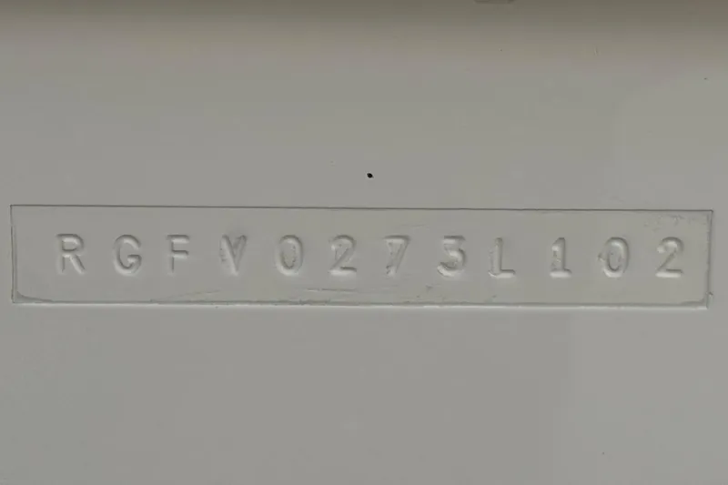 Slide: The Image of Hull identification number on a 2002 Monterey 248LS Montura Bowrider boat. - 32