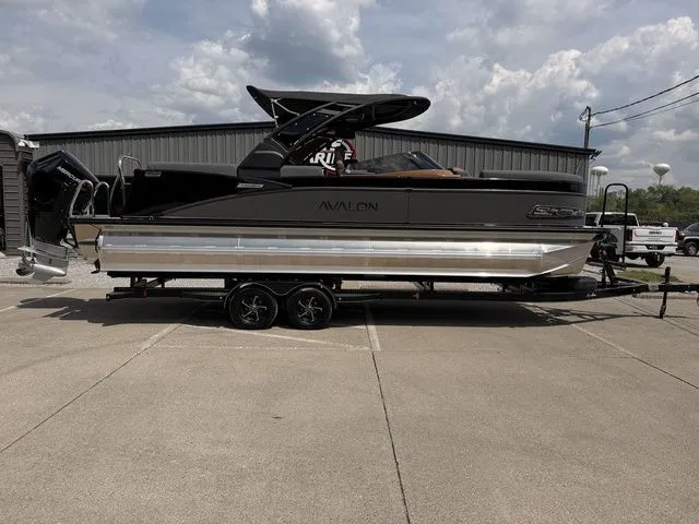 The Image of 2026 Avalon Catalina Quad Lounger boat on trailer, side view. - 1