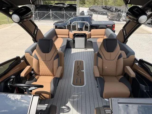 Slide: The Image of Luxurious Avalon Catalina Quad Lounger boat, 2026 model, featuring stylish seating. - 3