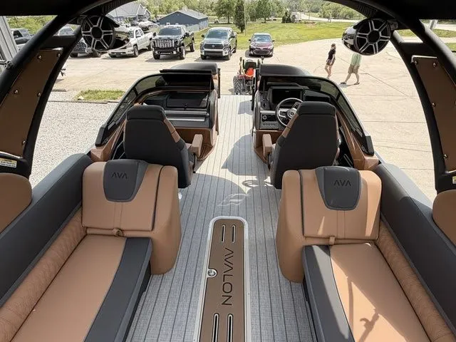 Slide: The Image of Interior view of Avalon Catalina Quad Lounger Windshield 2026 boat. - 6