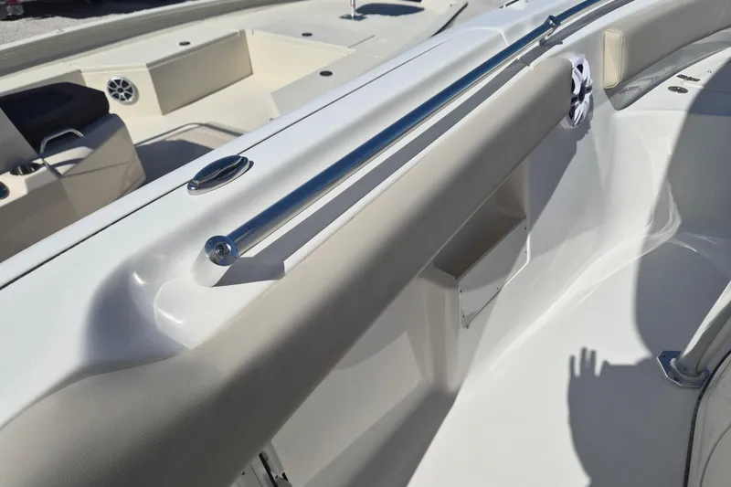 Slide: The Image of Interior view of 2026 Key West 239 FS boat, featuring sleek seating and stainless steel rail. - 15