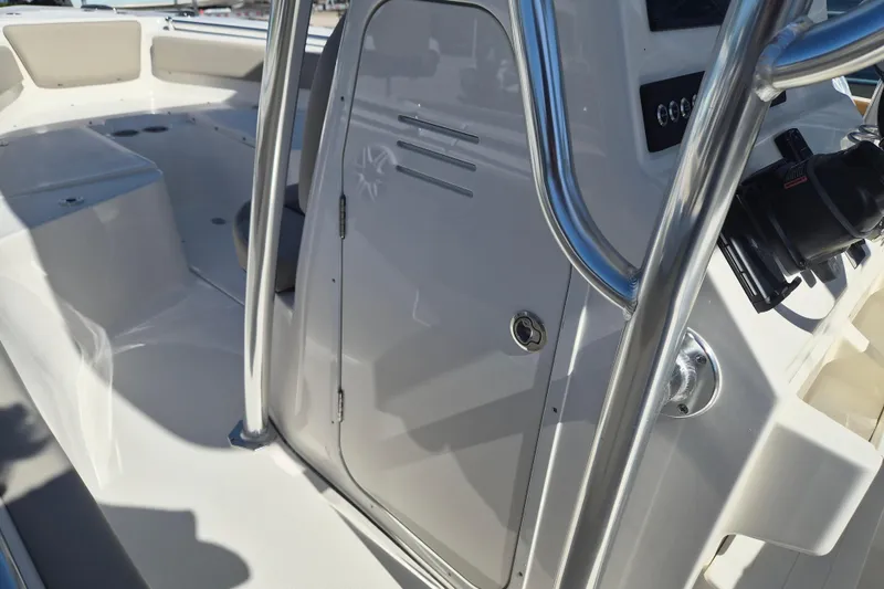 Slide: The Image of 2026 Key West 239 FS boat interior with sleek design and modern controls. - 16