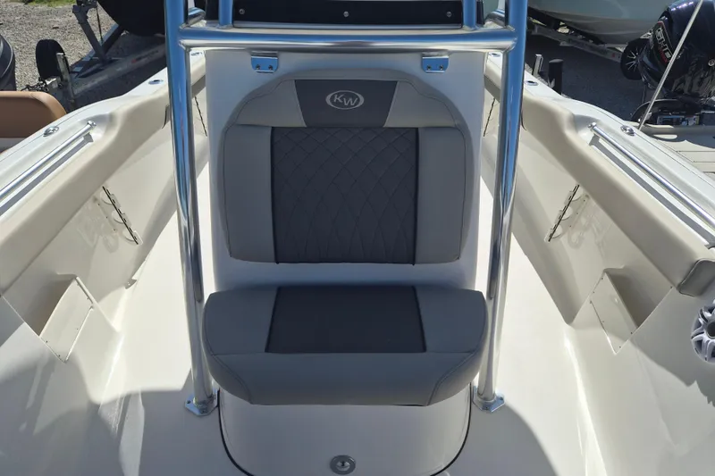 Slide: The Image of 2026 Key West 239 FS boat seating area with gray cushioned seats and stainless steel frame. - 20