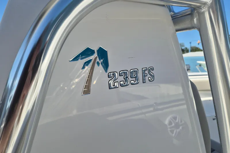 Slide: The Image of Close-up of 2026 Key West 239 FS boat logo on white surface. - 22