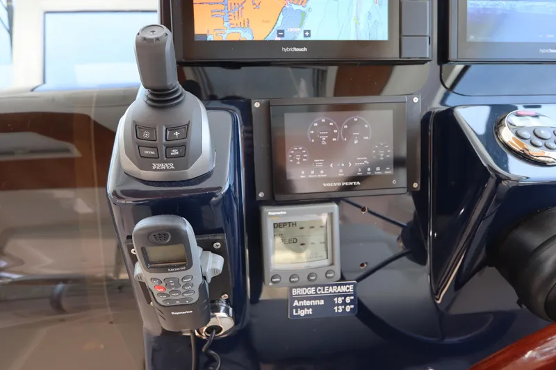 Slide: The Image of Control panel of a 2008 Tiara Yachts 4300 Sovran with navigation and communication equipment. - 33