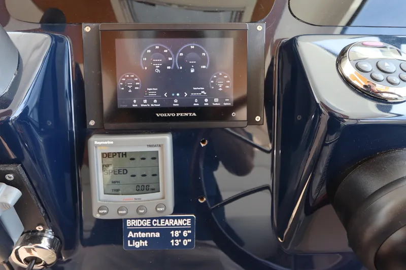Slide: The Image of Dashboard of a 2008 Tiara Yachts 4300 Sovran with Volvo Penta display and Raymarine Tridata. - 34