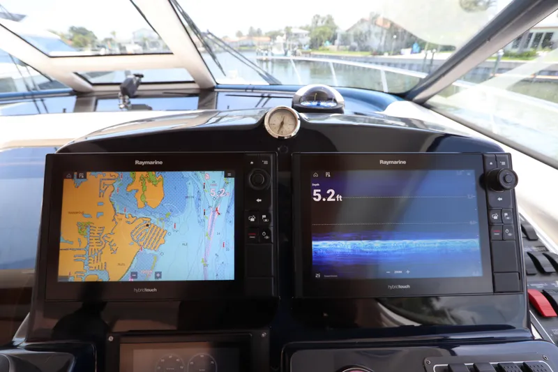 Slide: The Image of Dashboard of 2008 Tiara Yachts 4300 Sovran with Raymarine navigation displays. - 35