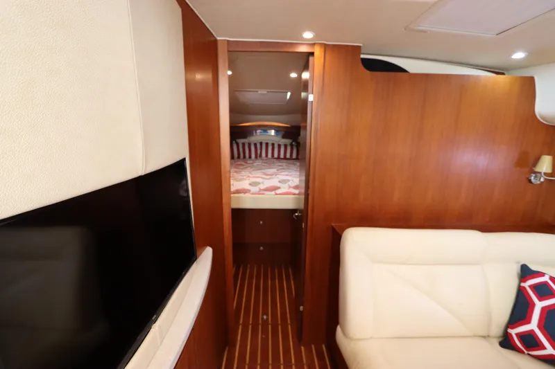 Slide: The Image of Interior of 2008 Tiara Yachts 4300 Sovran, featuring cozy cabin and modern furnishings. - 43